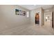 Neutral bedroom with carpet and view of the hall and walk in closet at 4340 Hatch Bend Ave, North Las Vegas, NV 89031