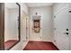 Hallway features mirror, neutral walls, and carpet flooring at 4340 Hatch Bend Ave, North Las Vegas, NV 89031