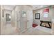 Hallway with neutral walls, and doors leading to various rooms. and decorative accents add character to the space at 4340 Hatch Bend Ave, North Las Vegas, NV 89031