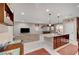 Open kitchen with granite countertop island connecting to living room, complete with modern appliances at 4340 Hatch Bend Ave, North Las Vegas, NV 89031