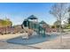 Community playground with a play structure featuring slides and climbing areas for activities at 4340 Hatch Bend Ave, North Las Vegas, NV 89031