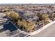 Aerial view of a two-story home with a well-maintained front yard and mature trees at 436 Trevinca St, Las Vegas, NV 89138