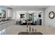 Kitchen island with granite countertop overlooks dining and living areas at 436 Trevinca St, Las Vegas, NV 89138