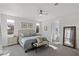 Spacious main bedroom with a ceiling fan, neutral carpet, and natural light at 436 Trevinca St, Las Vegas, NV 89138