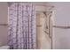 Bathroom with a shower and decorative curtain, showcasing the functional space at 4555 E Sahara Ave # 132, Las Vegas, NV 89104