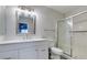 Bright bathroom featuring a sleek vanity with a modern sink and a glass-enclosed shower at 4555 E Sahara Ave # 132, Las Vegas, NV 89104