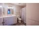 Well-lit bathroom with a vanity, toilet, and shower featuring modern fixtures and finishes at 4555 E Sahara Ave # 132, Las Vegas, NV 89104