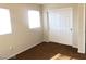 Bedroom featuring sliding closet doors and two bright windows at 4905 Morning Falls Ave, Las Vegas, NV 89131