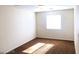 A light-filled bedroom with neutral walls and carpet at 4905 Morning Falls Ave, Las Vegas, NV 89131