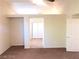 Bedroom with neutral paint, carpet, and closet at 4905 Morning Falls Ave, Las Vegas, NV 89131