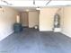 Spacious two-car garage with water heater at 4905 Morning Falls Ave, Las Vegas, NV 89131