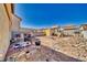 Spacious backyard showcasing the patio area, shed, and room for outdoor activities at 5179 Floralita St, Las Vegas, NV 89122