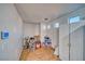 Versatile room featuring laminate floors, natural light, and storage cabinets, adaptable for various purposes at 5179 Floralita St, Las Vegas, NV 89122