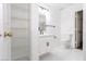 Bathroom featuring a vanity, toilet and shelving at 5225 W Reno Ave # 105, Las Vegas, NV 89118