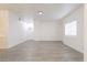 Bright living room boasts light wood floors and natural lighting at 5225 W Reno Ave # 105, Las Vegas, NV 89118