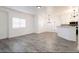 Open-concept living space with light wood floors and bright lighting at 5225 W Reno Ave # 105, Las Vegas, NV 89118