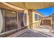 Covered patio with ample sunlight, patio set visible through glass door at 536 Greenbriar Pl, Boulder City, NV 89005