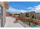 Large covered balcony offering views of lush landscaping and neighborhood homes at 5868 Revital Ct, Las Vegas, NV 89131