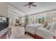 Large main bedroom featuring a fireplace, sitting area, and natural light from exterior windows at 5868 Revital Ct, Las Vegas, NV 89131