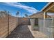 The backyard features brick pavers and fencing at 6035 Eganridge Ct, North Las Vegas, NV 89081