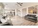 Open concept living room showcasing hardwood floors, recessed lighting, and open to the kitchen area at 6035 Eganridge Ct, North Las Vegas, NV 89081