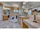 Primary bathroom featuring double sinks, a built in soaking tub, and vanity area at 65 Luce Del Sole # 1, Henderson, NV 89011