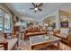 Spacious living room with an open layout and a mix of modern and traditional decor at 65 Luce Del Sole # 1, Henderson, NV 89011