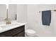 Bathroom with a vanity, toilet, and towel bar at 6618 Palm Branch St, North Las Vegas, NV 89086