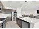 Modern kitchen featuring stainless steel appliances, a large island, and an open layout at 6618 Palm Branch St, North Las Vegas, NV 89086