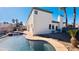 Spacious backyard with pool and landscaping, perfect for outdoor entertaining at 7244 Buglehorn St, Las Vegas, NV 89131