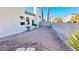 Low maintenance backyard with gravel and block wall provides private outdoor space at 7244 Buglehorn St, Las Vegas, NV 89131