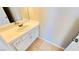 Cozy bathroom features a white vanity, tile flooring, and a bright mirror at 7244 Buglehorn St, Las Vegas, NV 89131