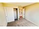 Cozy bedroom featuring carpeted floor, closet with sliding doors and neutral wall color at 7244 Buglehorn St, Las Vegas, NV 89131