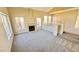 Bright and airy living room with vaulted ceilings, fireplace, and staircase leading to the second floor at 7244 Buglehorn St, Las Vegas, NV 89131