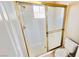 Shower with glass doors and bright interior at 7244 Buglehorn St, Las Vegas, NV 89131