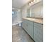 Bathroom featuring a shower, toilet, and vanity with granite countertops at 7325 Sunray Point St, North Las Vegas, NV 89084