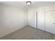 Bedroom featuring doors, neutral carpeting and neutral walls at 7325 Sunray Point St, North Las Vegas, NV 89084