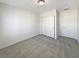 Spacious bedroom with a closet and door at 7325 Sunray Point St, North Las Vegas, NV 89084