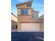 Attractive two-story home with an attached two-car garage and well-maintained facade at 7325 Sunray Point St, North Las Vegas, NV 89084