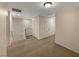 Second story hallway with neutral colors and doors at 7325 Sunray Point St, North Las Vegas, NV 89084