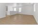 Spacious loft area with wood flooring and ample natural light at 7452 Wine Creek St, Las Vegas, NV 89139