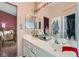 Bright bathroom with dual sink vanity, large mirror, and plenty of counter space at 7835 Meandering Path Ave, Las Vegas, NV 89131