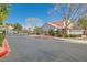 Community entrance with a gated entry and manicured landscaping adds to the neighborhood's appeal at 7835 Meandering Path Ave, Las Vegas, NV 89131