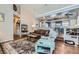 Inviting living room with vaulted ceiling, open to the kitchen and dining areas at 7835 Meandering Path Ave, Las Vegas, NV 89131