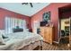 Large main bedroom with a closet and dresser, great natural light, and ceiling fan at 7835 Meandering Path Ave, Las Vegas, NV 89131