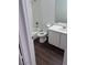 Bathroom with white fixtures, tile flooring, and a shower-tub combo at 8600 W Charleston Blvd # 2195, Las Vegas, NV 89117