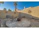 Cozy backyard firepit area, perfect for entertaining and relaxation at 9532 Cliff View Way, Las Vegas, NV 89117