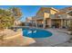 Enjoy a private backyard oasis with a sparkling pool, patio area perfect for relaxing and entertaining at 9532 Cliff View Way, Las Vegas, NV 89117