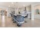 Gourmet kitchen features a large island with seating, pendant lighting, and stainless steel appliances at 10438 Skye Arroyo Ave, Las Vegas, NV 89166