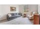Comfortable living room featuring a neutral color palette, bright natural light, and comfortable seating at 10438 Skye Arroyo Ave, Las Vegas, NV 89166